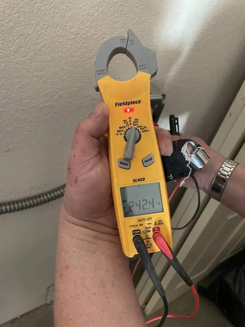 Voltage testing with clamp meter during Hot Tub / Pool Electrical Wiring in Highgate